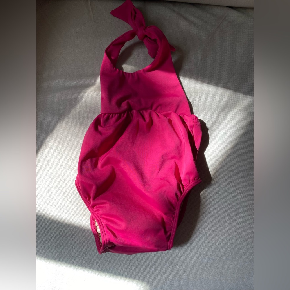 Magenta baby swimmer